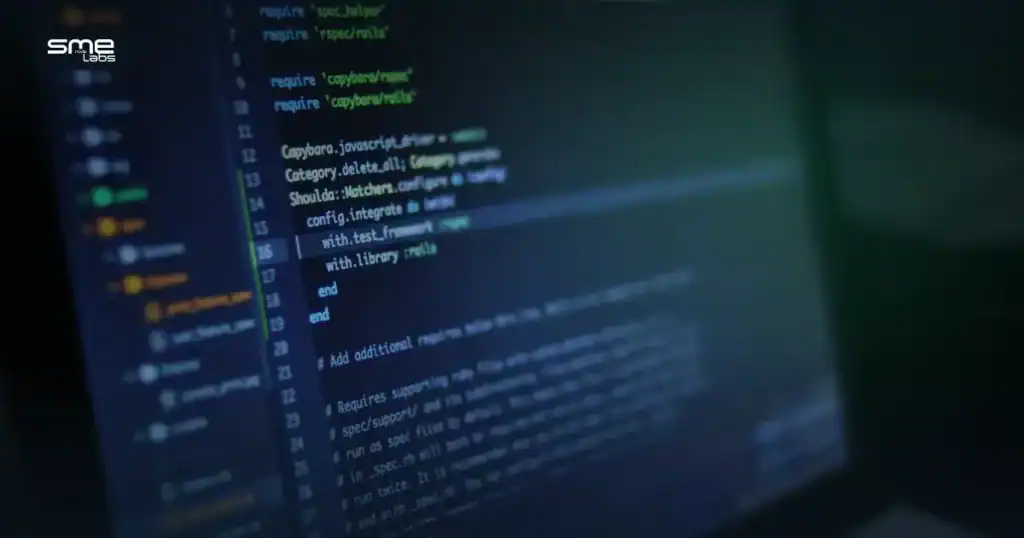 Close-up of a dark code editor screen, duotone teal and blue wash