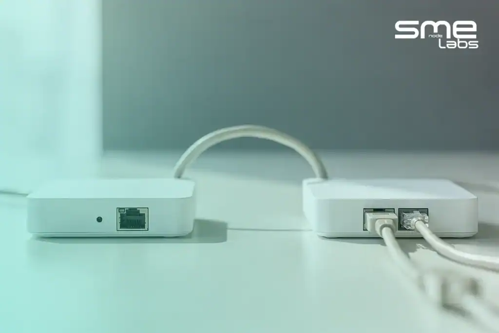 Two network switches joined by one Ethernet cable, representing a MikroTik bridge and an EoIP link
