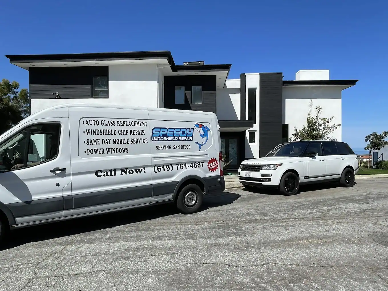 Speedy Windshield Repair mobile service van parked outside a modern Southern California home after an on-site windshield replacement