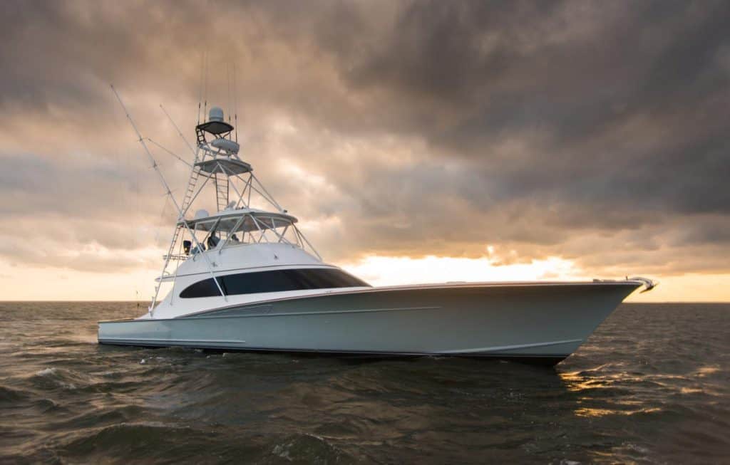 Spencer sportfishing yacht on open water under stormy sky