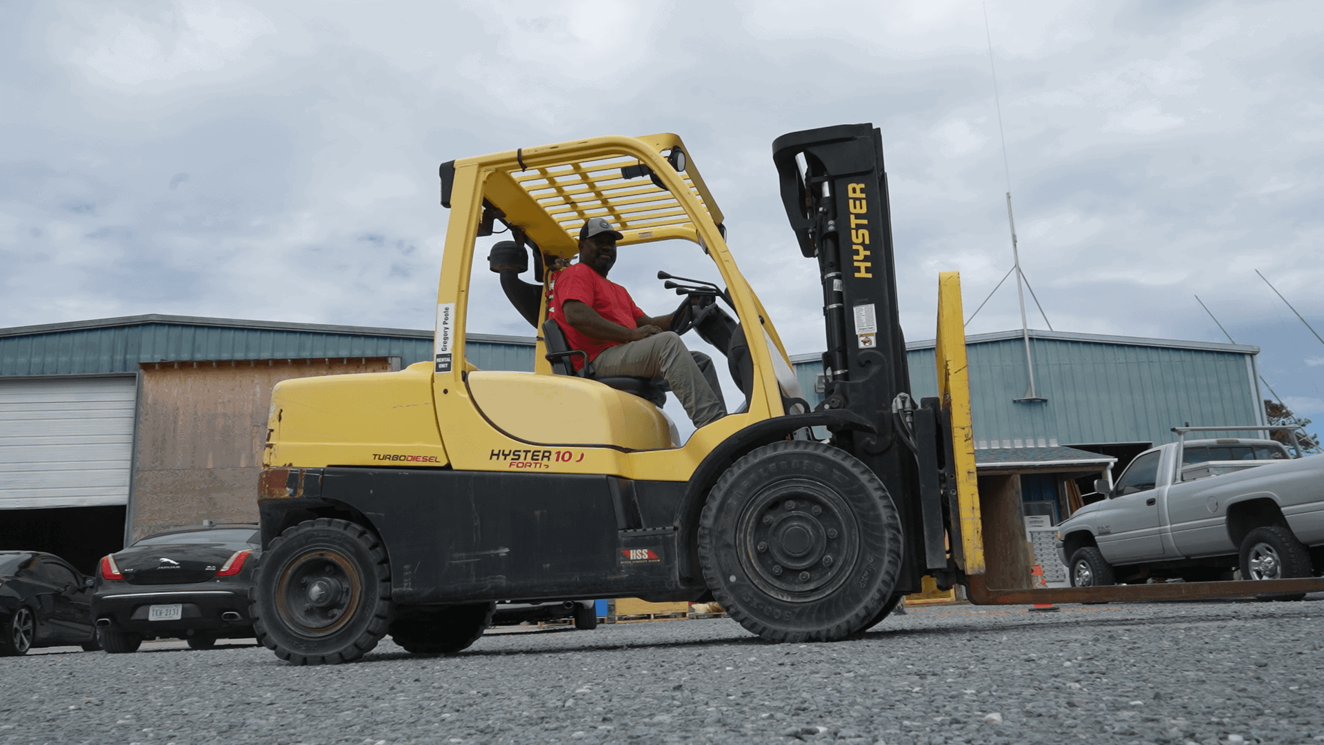 Forklift transporting heavy marine materials at Spencer Marine