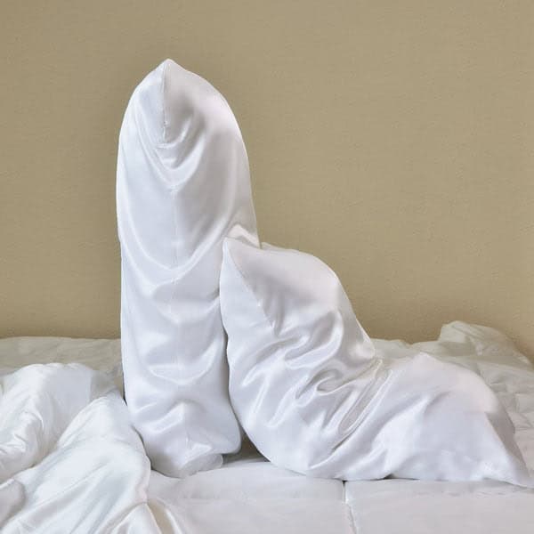 Promeed hydrating mulberry silk pillowcase in ivory on plush bed for cozy comfort curator dad fathers day