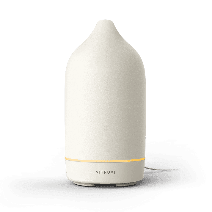 Vitruvi white stone ceramic essential oil diffuser for intentional ritualist dad fathers day evening ritual.