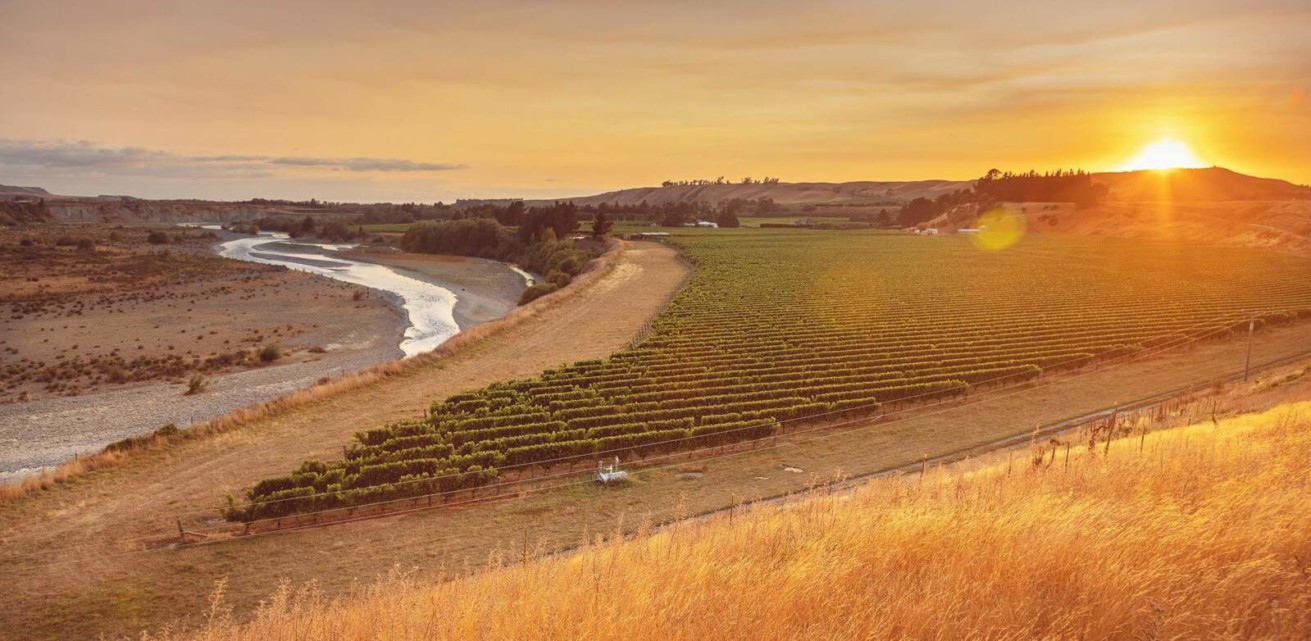 Awatere Valley with river to left and hills and sunset to right