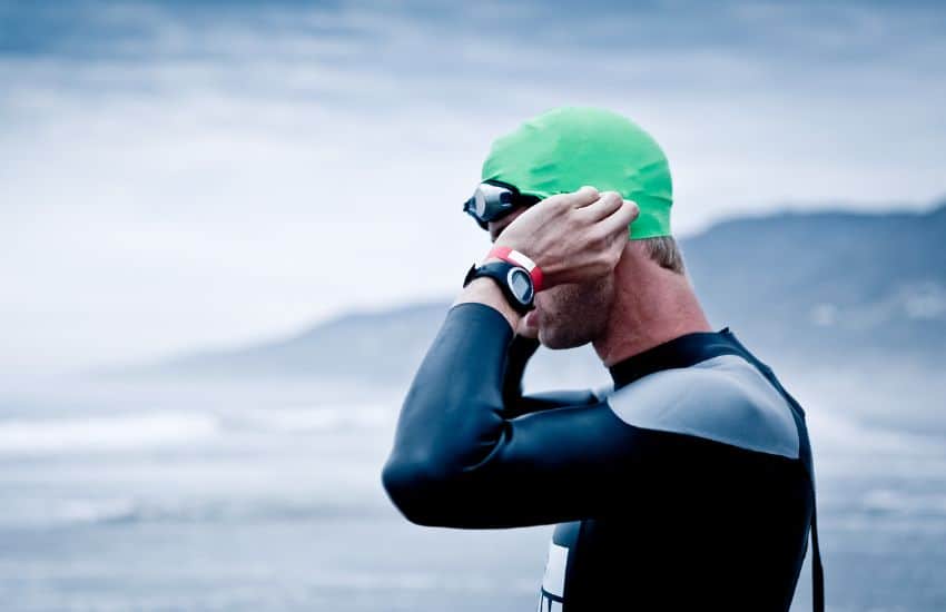 What Do You Wear Under a Wetsuit? 3 swimmer in wetsuit