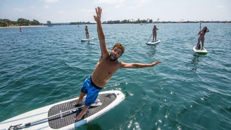 How to Fall Off a Paddle Board Safely & Get Back On
