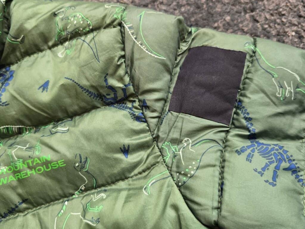 Down repair patch on childs jacket