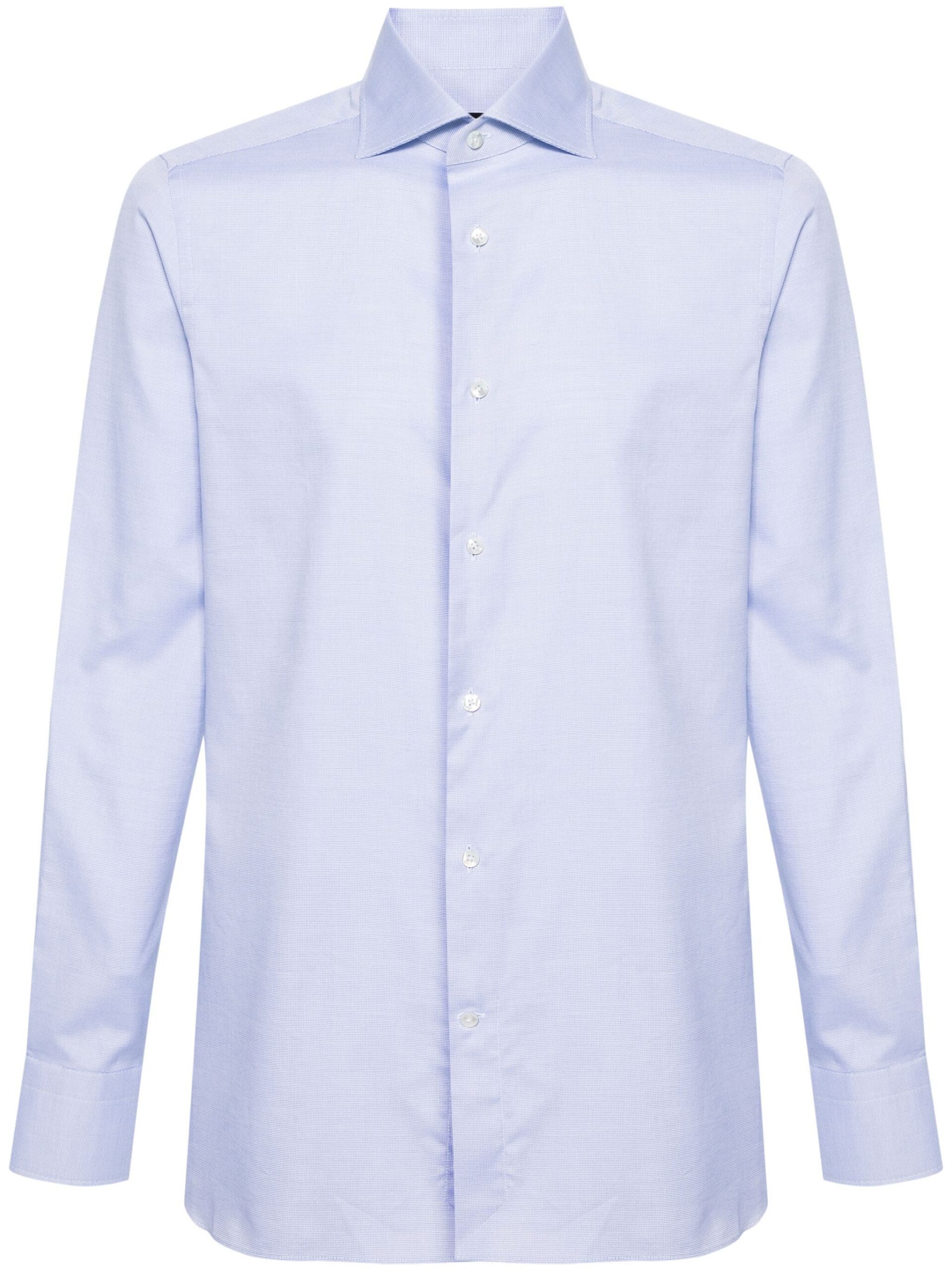 Camisa social azul clara para homem, estilo formal e elegante.
