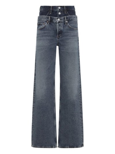 Calças de ganga femininas de lavagem escura com corte wide-leg para um estilo casual e confortável.