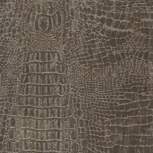 Luxe interieurstoffen met crocoprint. Hoogwaardige meubel- en gordijnstoffen met krokodillenprint.