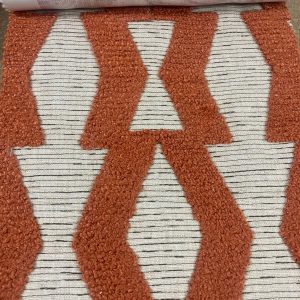 Stoffen voor interieur en vloerkleden, trendy kleuren en duurzame kwaliteit, ideaal voor woninginrichting.