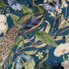 Luxe interieurstoffen met vogels en bloemen, perfect voor raamdecoratie en meubelstoffen.