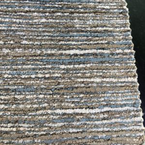 Interieurstoffen-kleedje. Kleurrijke, comfortabele interieurstoffen voor gordijnen en bekleding.