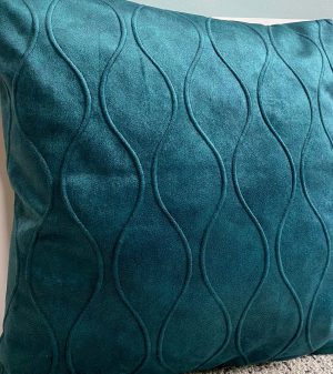 Stijlvolle turquoise interieurstoffen voor banken en decoraties.