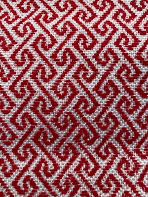 Interieurs stoffering met rood en wit patroon. Hoogwaardige interieurstoffen met sierlijk rood-wit patroon voor home decor.