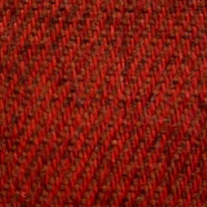 Gedetailleerde close-up van rode interieurstoffen met fijne textuur en weefpatroon.