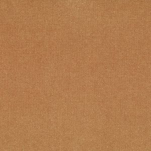 Alt: Close-up van warme, textuurrijke interieurstoffen in koperkleurige tinten.