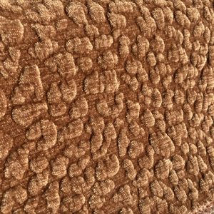 Bubbels meubelstof Fancy Fabrics Bubbels 7 Meubelstof Fancy Fabrics. Luxe bruine meubelstof met bubbels patroon voor interieur.