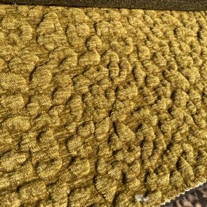StoffenBarn Bubbels 651 meubelstof Bubbels 651 meubelstof Fancy Fabrics. Gele meubelstof met een bobbelstructuur voor meubels en interieur.