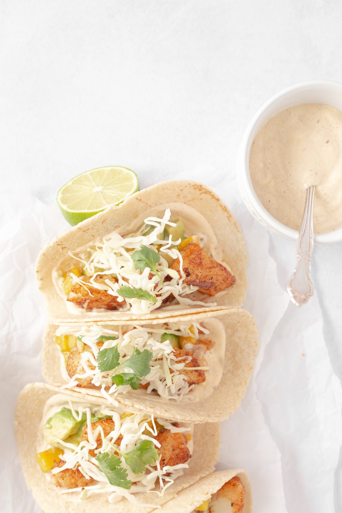 Cod Tacos with Mango Avocado Salsa assembled (top down, close-up)