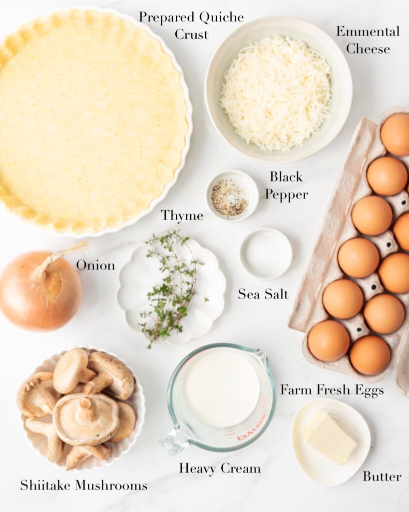 Ingredients for onion and mushroom quiche portioned out into bowls.