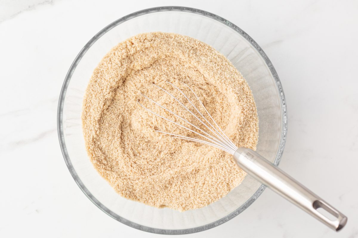 Process shot #1: Dry ingredients whisked together in a glass mixing bowl.