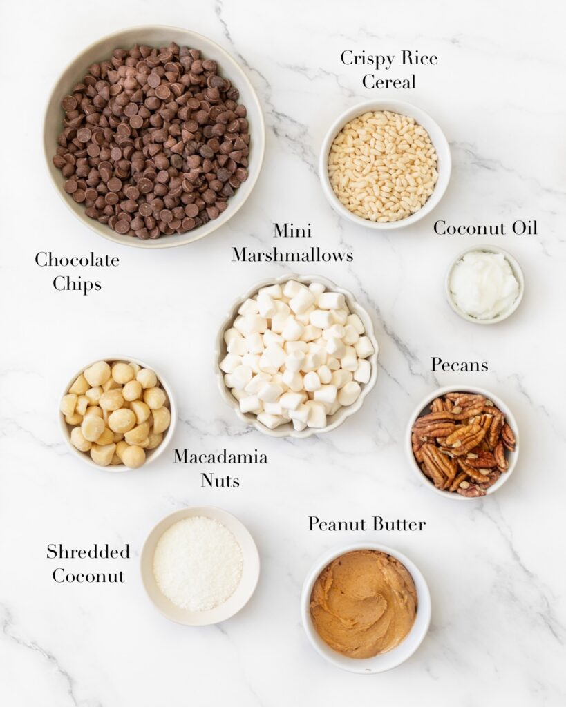 Ingredients for No Bake Rocky Road Bars portioned out on a marble slab.