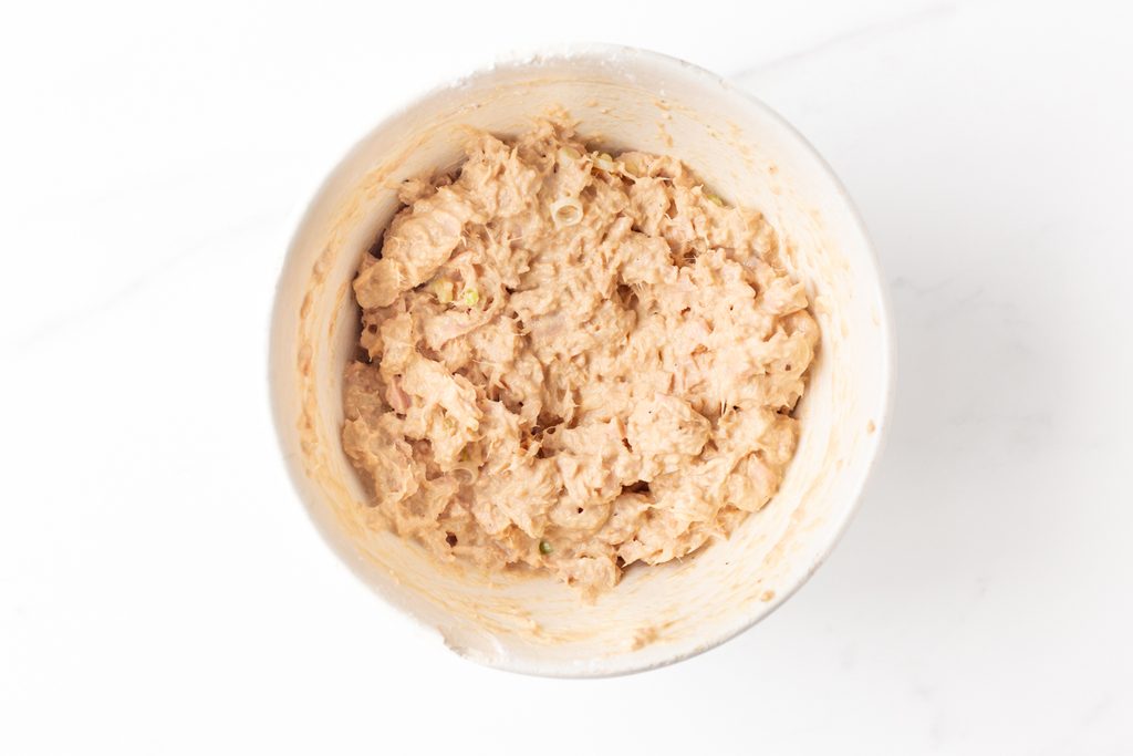 Process shot #2: Tuna mixed in a small bowl with whites of green onion, egg, soy seasoning, arrowroot and mayonnaise.