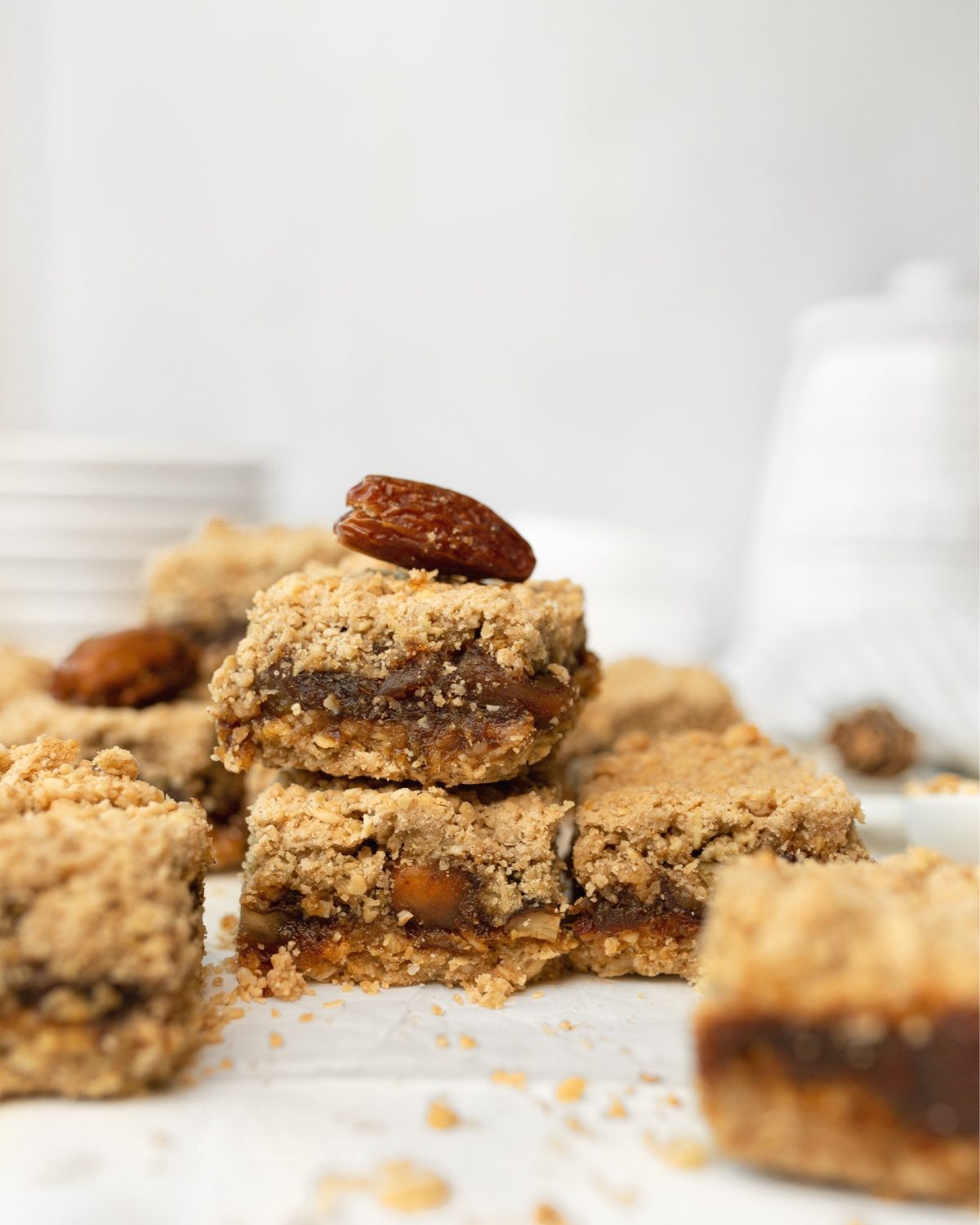2 Gluten-free Chewy Date Bars stacked on top of each other. 