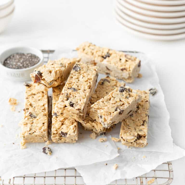 No Bake Protein Granola Bars cut and layered on a cooling rack.