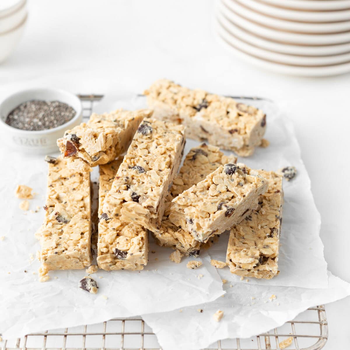 No Bake Protein Granola Bars cut and layered on a cooling rack.