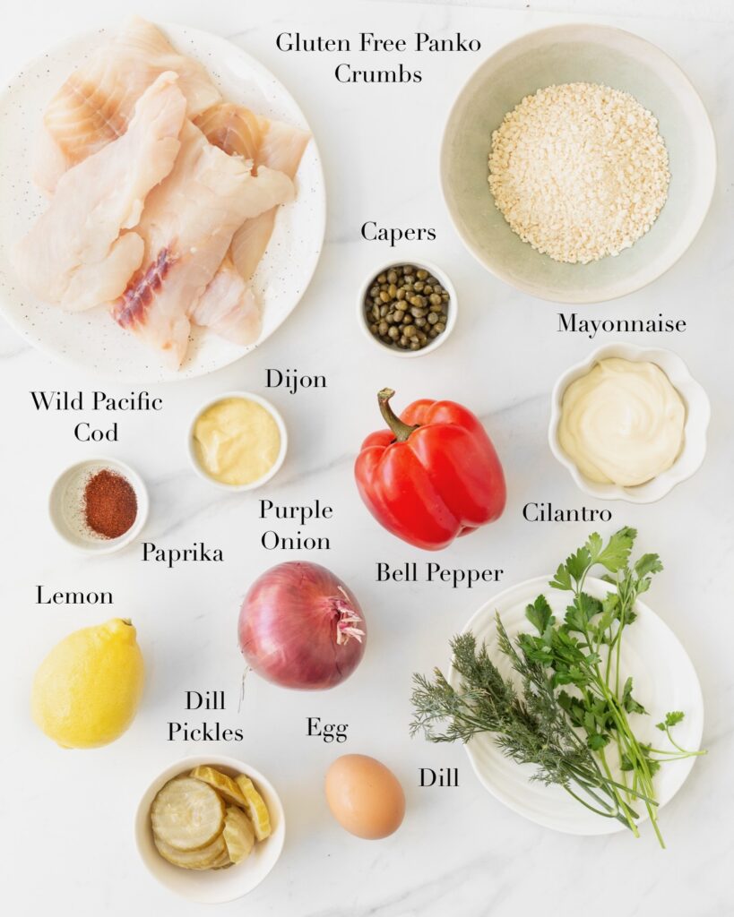 Ingredients for Air Fryer Cod Cakes portioned out on a marble slab.