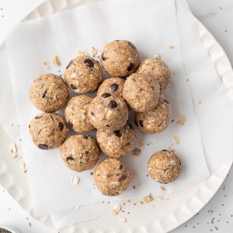 Chocolate Almond Butter Protein Bites on a parchment-lined plate.