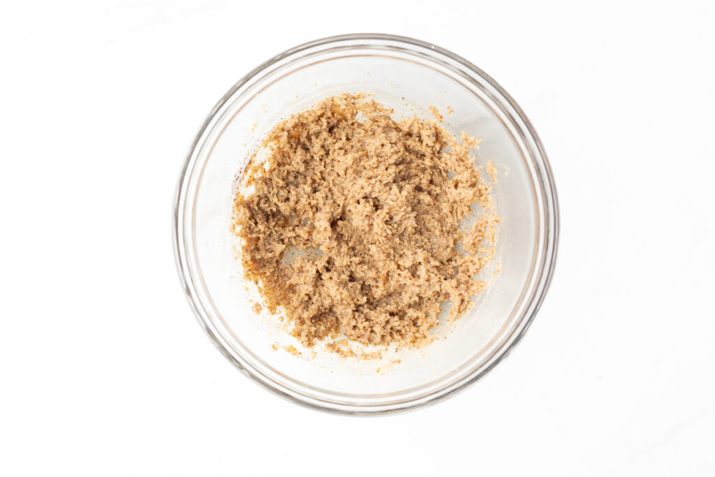 Process shot #1: Softened butter, sugar, espresso powder and vanilla extract mixed in a glass mixing bowl.