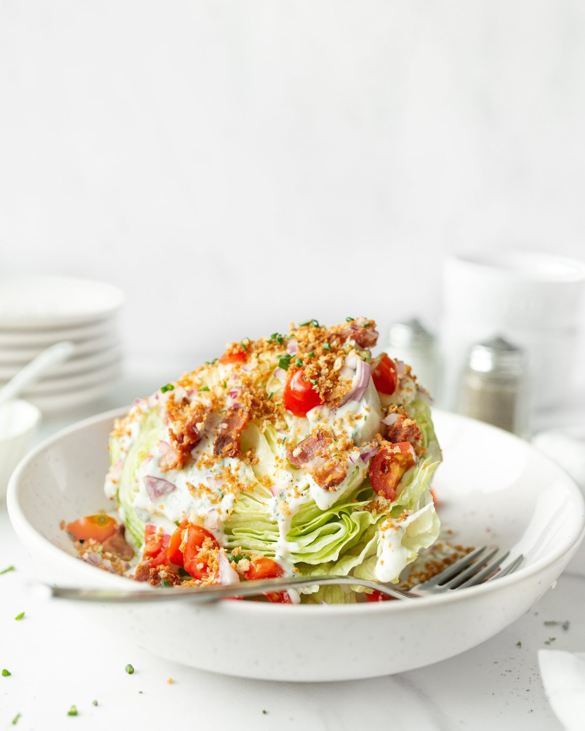Summer Wedge Salad with Ranch Dressing plated and dressed.