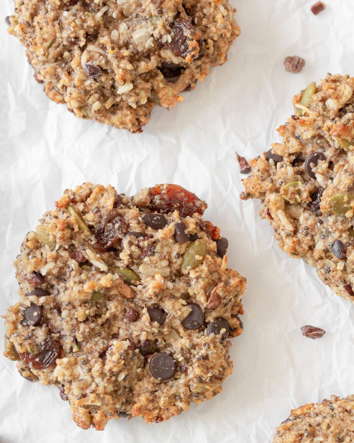 Gluten Free Superfood Breakfast Cookies baked on parchment paper.