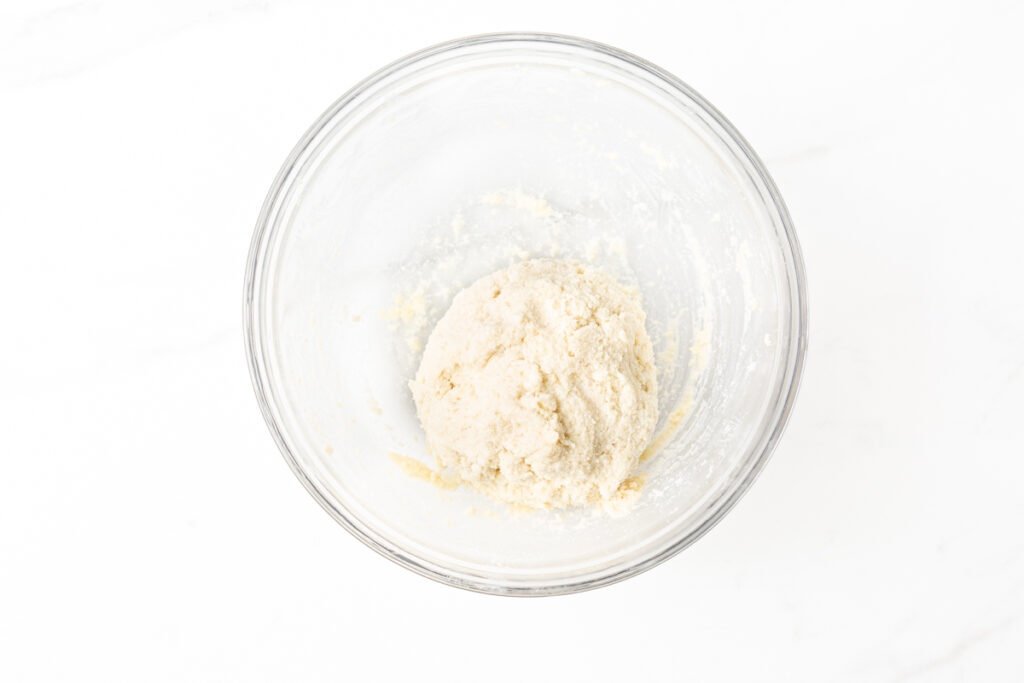Process shot #2: Almond Flour Protein Bagels Dough mixed together in a glass mixing bowl.