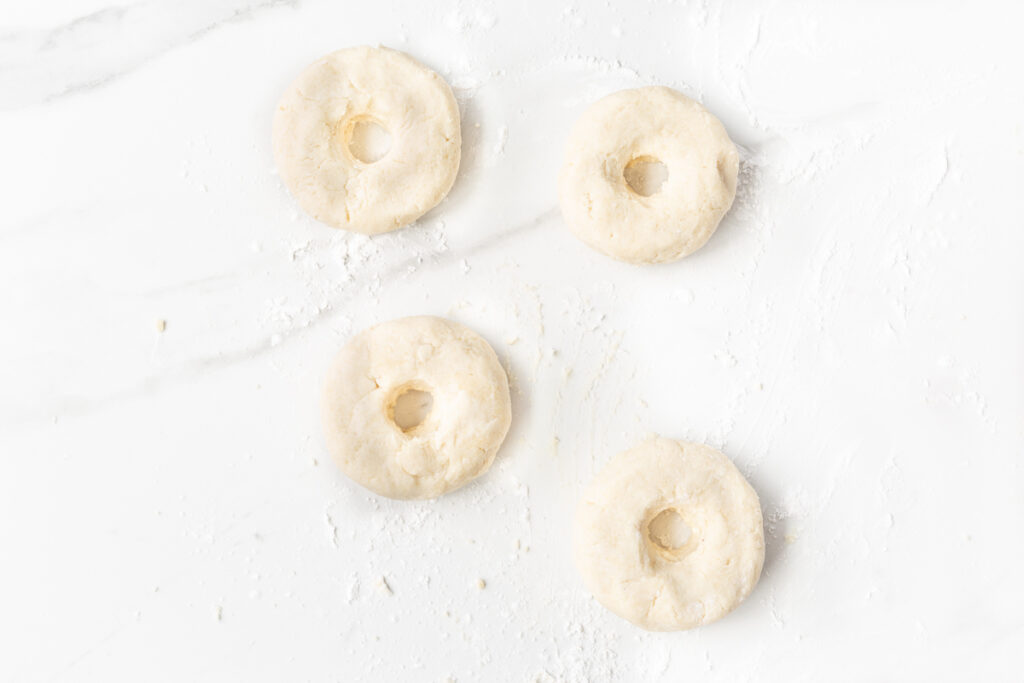 Process shot #4: Almond flour dough formed into 4 bagels.