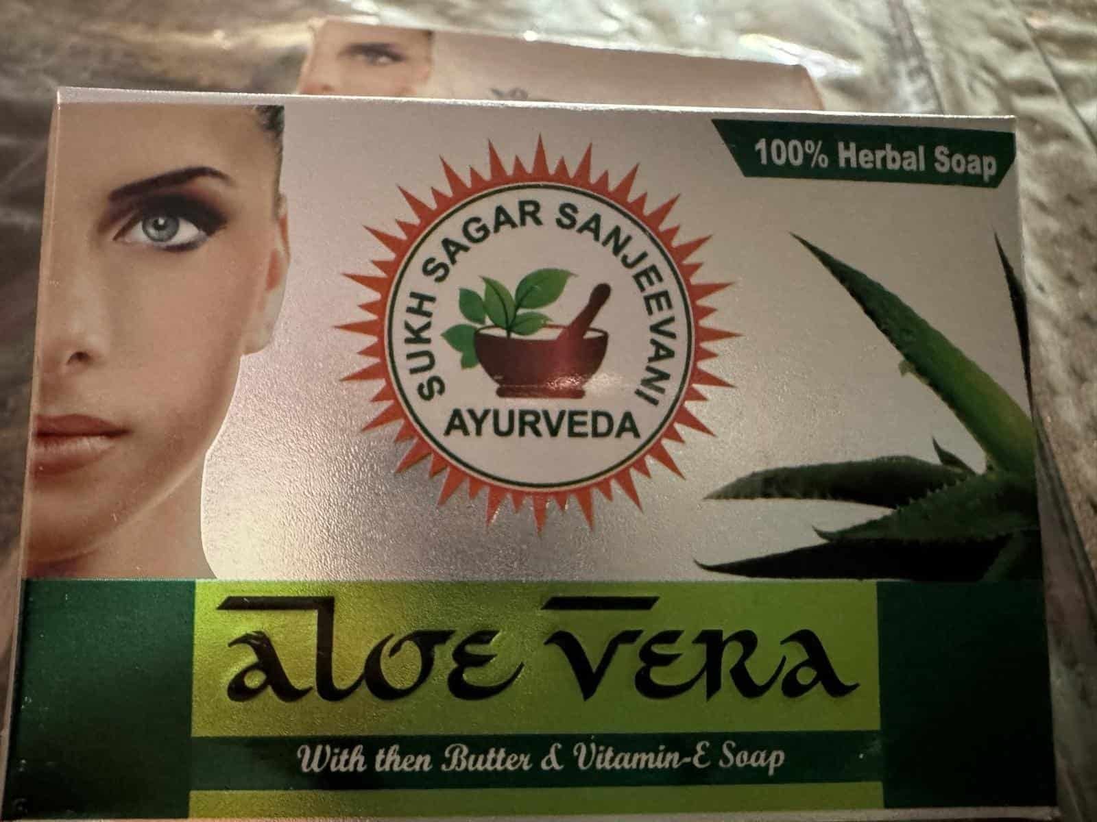 Aloe Vera Herbal Soap packaging with aloe vera plant image and skincare branding.