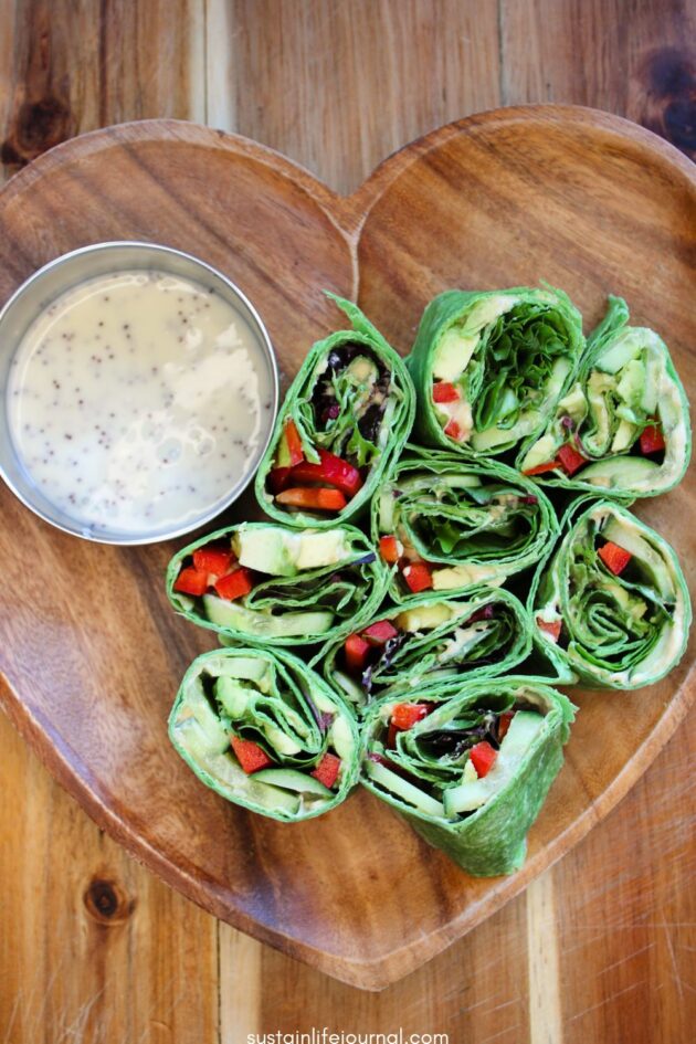 vegan pinwheels with vegan salad dressing for dipping