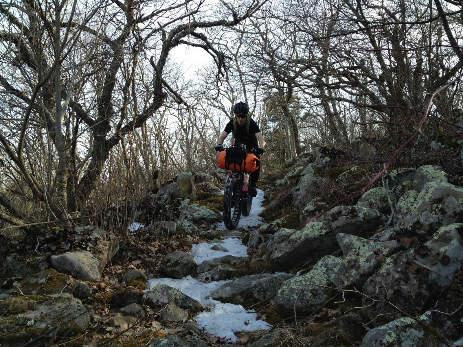 Riding the rocks just below the top