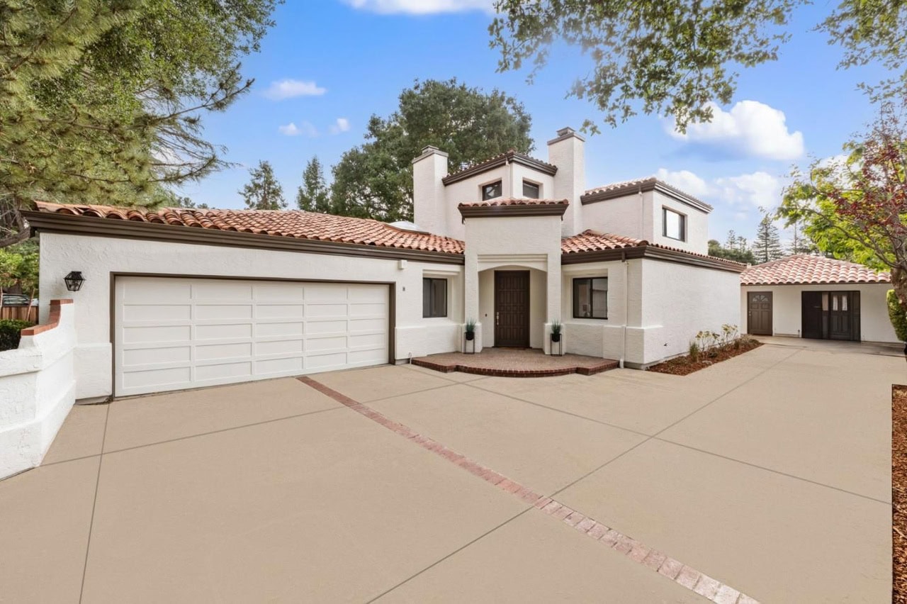 Beautiful modern house in Los Altos, CA with a spacious driveway and Mediterranean-style architectur.