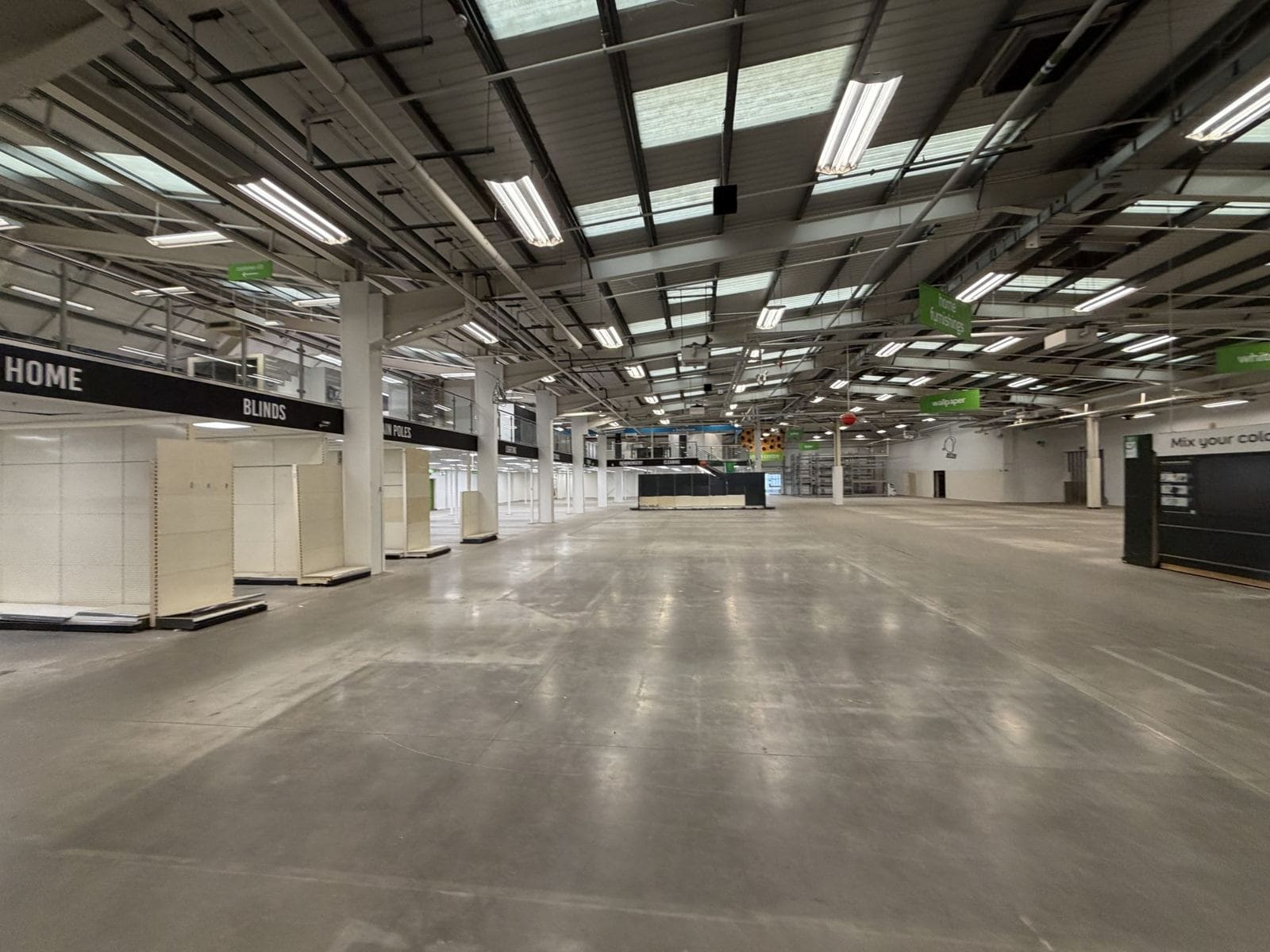 Retail Fit-Out Cost Management: Homebase to The Range, Upton 3 Main sales floor with old Homebase signage before strip-out