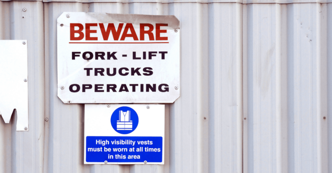 forklift caution sign on a building