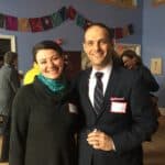 Community Launch at Mayo Street Arts with smiling attendees.