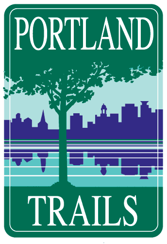 Portland Trails sign featuring city skyline and tree silhouette.