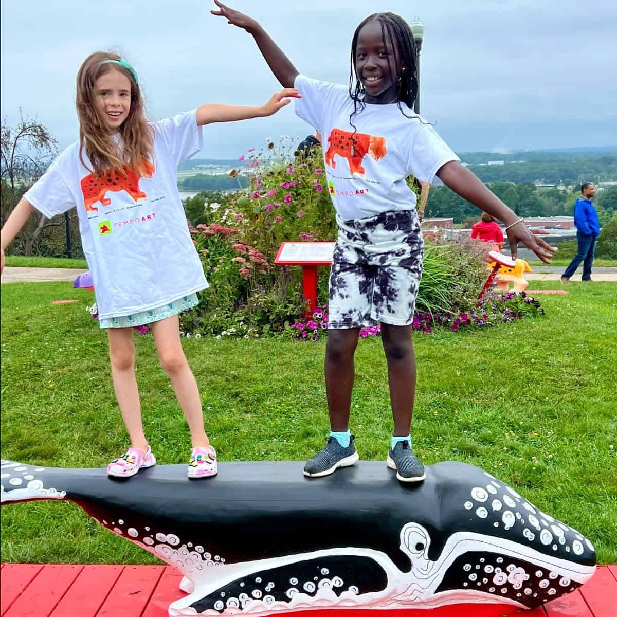 Children enjoying public art installation during Summer 2023 program.
