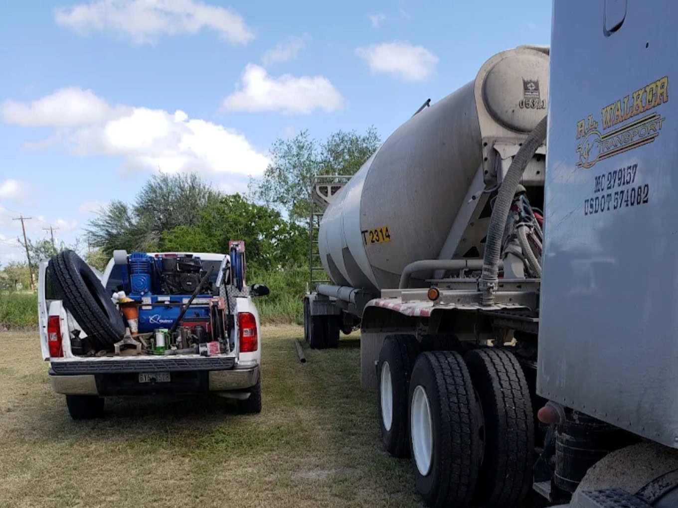 Service vehicle with equipment at Texas Automotive & Tire LLC.