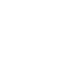 Mitsubishi car in front of Texas Tire LLC auto shop.