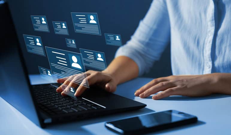 Executive reviewing candidate profiles to avoid the high cost of a bad hire in nonprofit leadership search